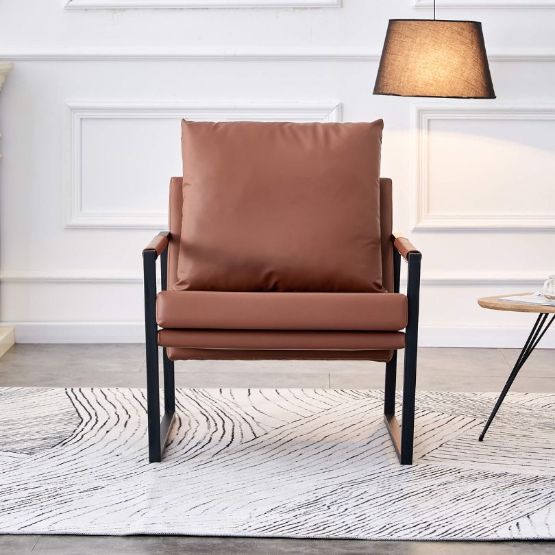 Chic brown PU leather chair with metal frame from the side, showcasing its sleek design.