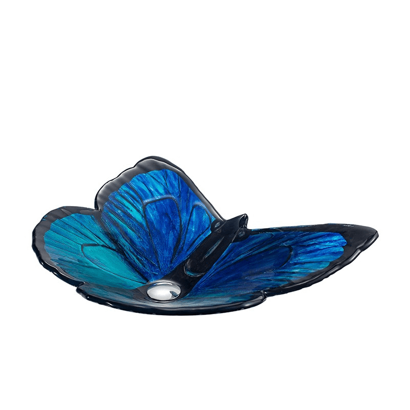 Close-up view of the elegant butterfly-shaped bathroom sink showcasing its tempered glass and waterfall faucet.