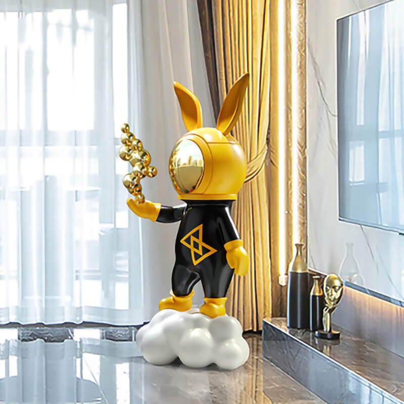 Charming cartoon rabbit resin statue placed in a cozy living room.
