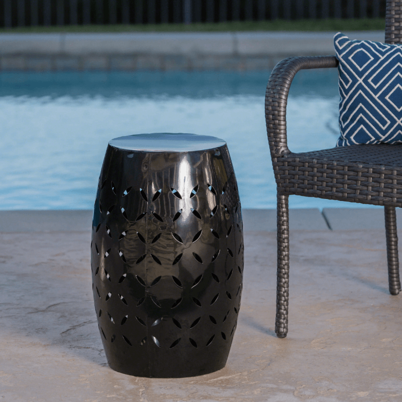 Close-up of the iron side table showcasing its sleek design and sturdy frame