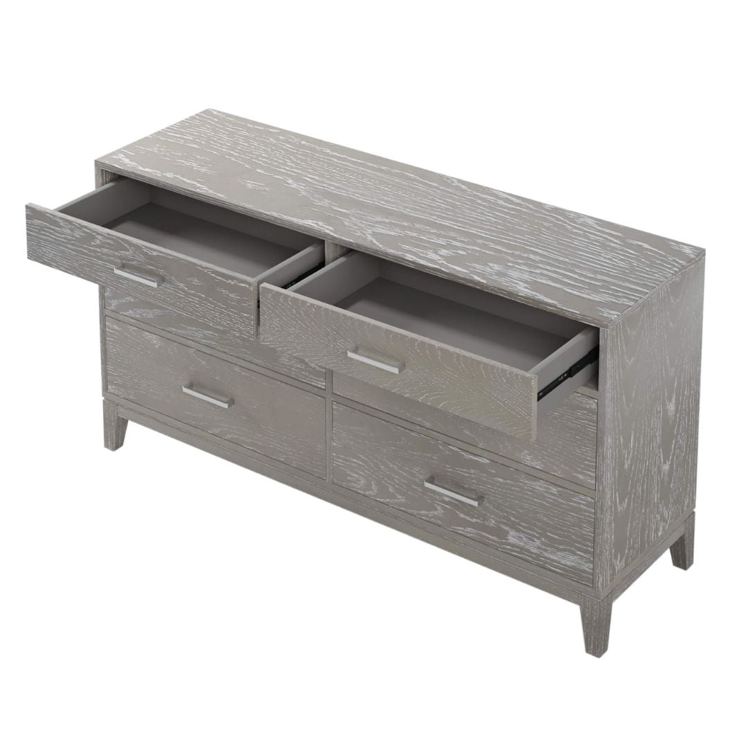 Close-up of the smooth-gliding drawers of the gray wood dresser highlighting storage space.