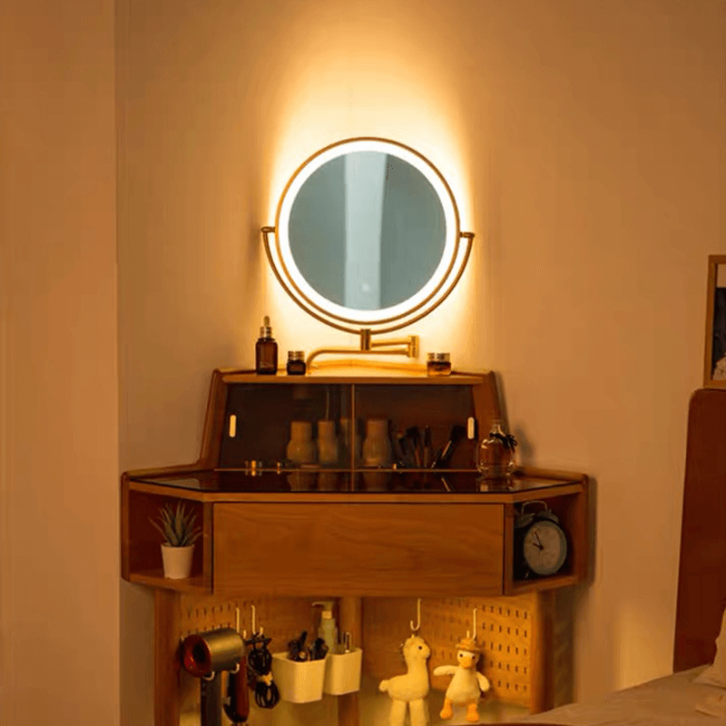Close-up of the lighted mirror and drawer of the corner vanity, perfect for daily beauty routines.