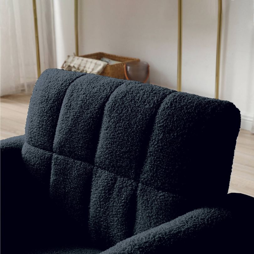 Elegant dark blue teddy accent chair from the side, showcasing its plush finish and gold metal legs.