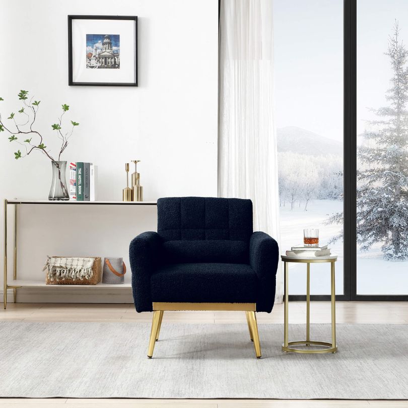 Elegant dark blue teddy accent chair from the side, showcasing its plush finish and gold metal legs.