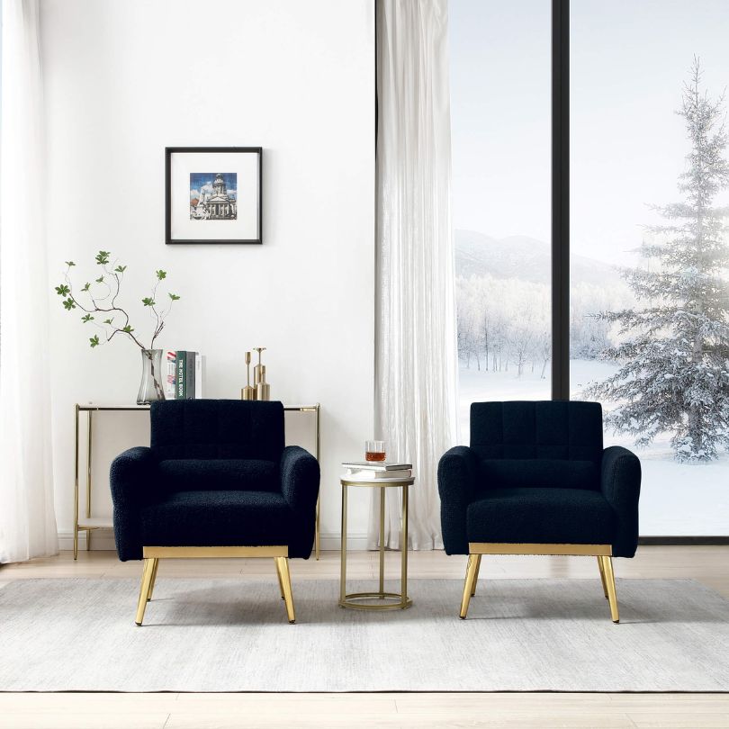 Cozy setup featuring the dark blue teddy armchair with a waist pillow in a modern living room.