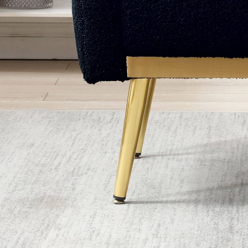 Close-up view of the plush teddy fabric on the dark blue accent chair, highlighting its comfort.