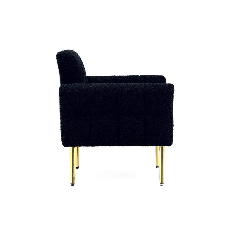 Cozy setup featuring the dark blue teddy armchair with a waist pillow in a modern living room.