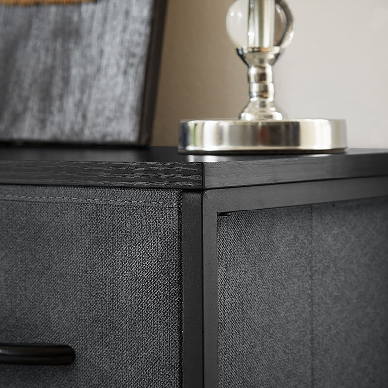 Sleek modern dark gray dresser with five spacious drawers, ideal for bedroom use.