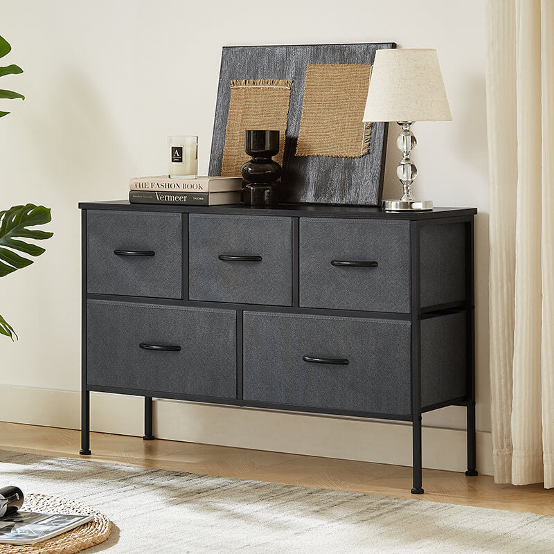 Stylish dresser used as a TV stand in a cozy living room setting.