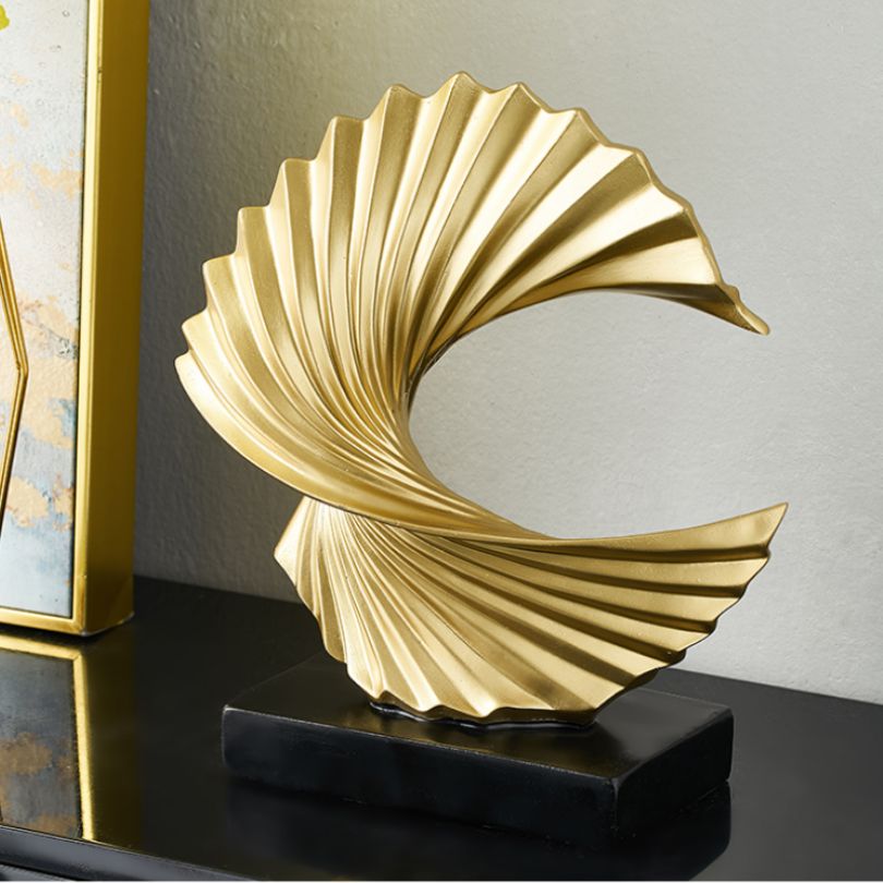 Close-up of the golden resin statues surface texture and color variations.