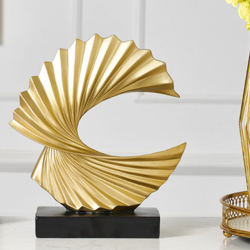 Close-up of the golden resin statues surface texture and color variations.