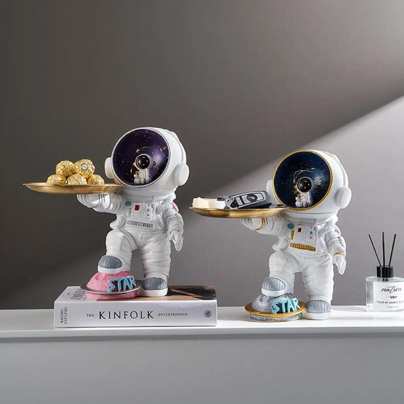 Close-up view of the astronaut decorative tray, perfect for organizing small trinkets.