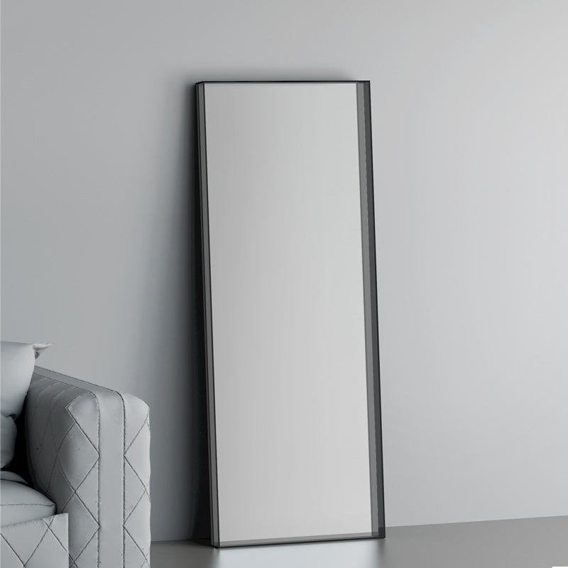 Full view of the stylish floor mirror for modern decor set in a colorful living room corner