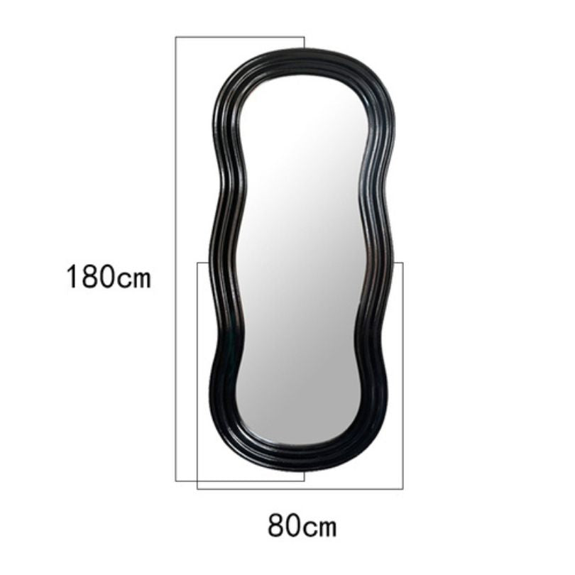 The full body mirror reflecting a beautiful hallway with elegant decor.