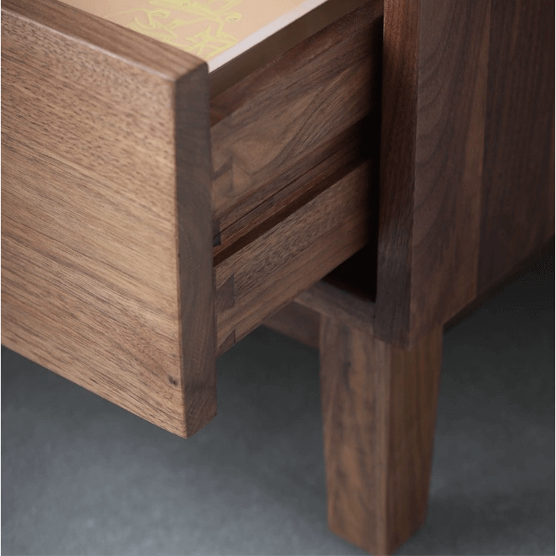 Front view of the stylish modern storage cabinet in a living room setting.