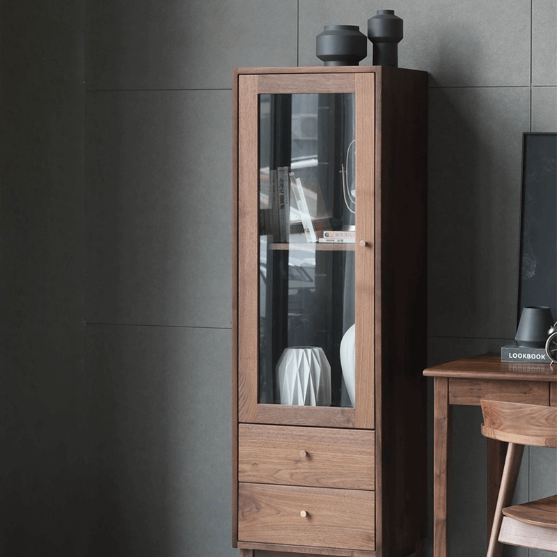 Close-up of the cabinets sleek walnut finish and glass shelves.