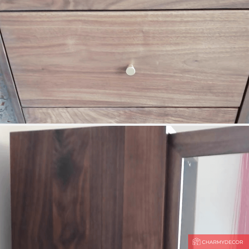 Close-up of the cabinets sleek walnut finish and glass shelves.