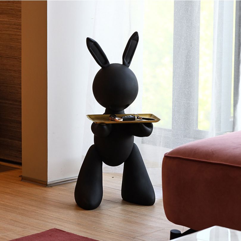 Side view of the chic resin rabbit statue with tray, perfect for modern decor.