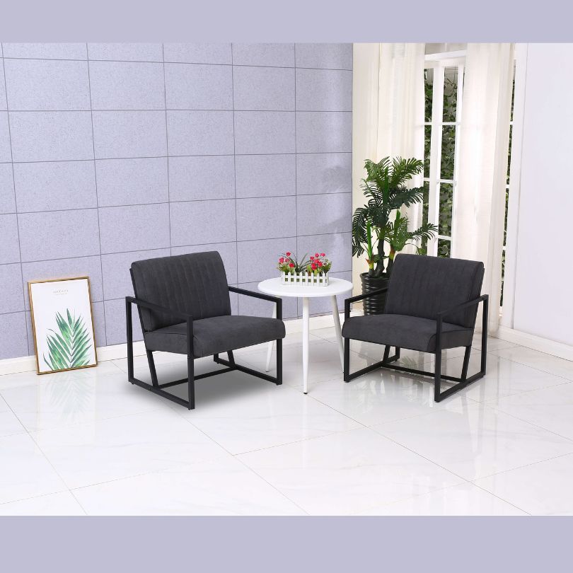 Steel armchair styled in living room setup with soft lighting and neutral decor