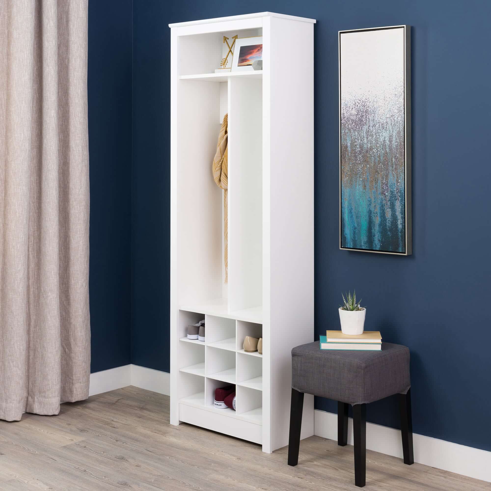 Close-up of the upper shelf and coat hooks on the entryway organizer.