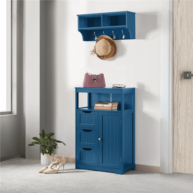 Top angle showing decorative items on the open shelf of the freestanding cabinet.