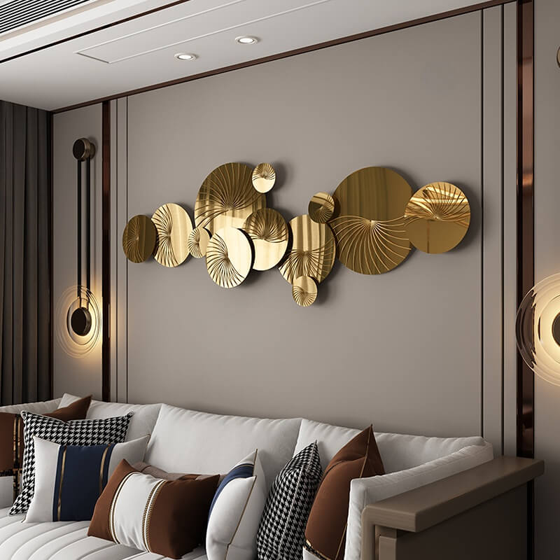 Stylish living room featuring modern gold wall art as a focal point