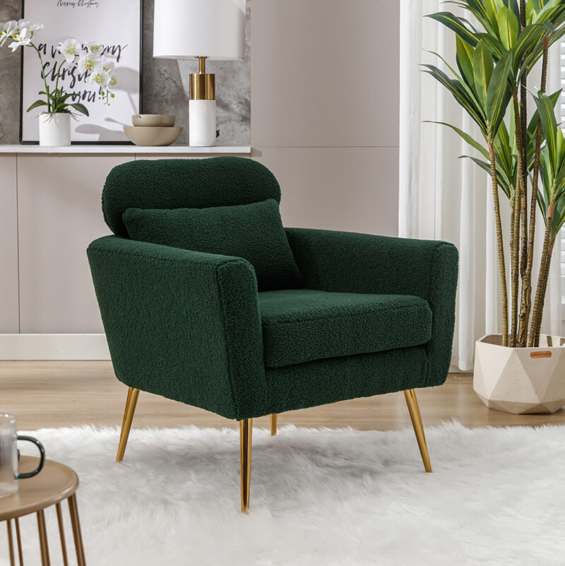 Chic green boucle accent chair from the side, showcasing its modern design.