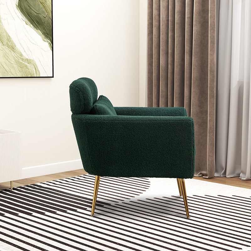 Close-up of the high-quality fabric and gold metal base of the accent chair.