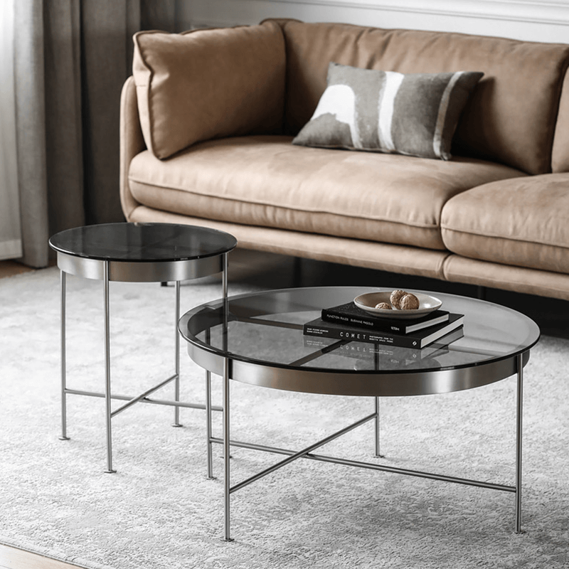 Elegant Italian round glass coffee table showcasing its modern design from a top angle.