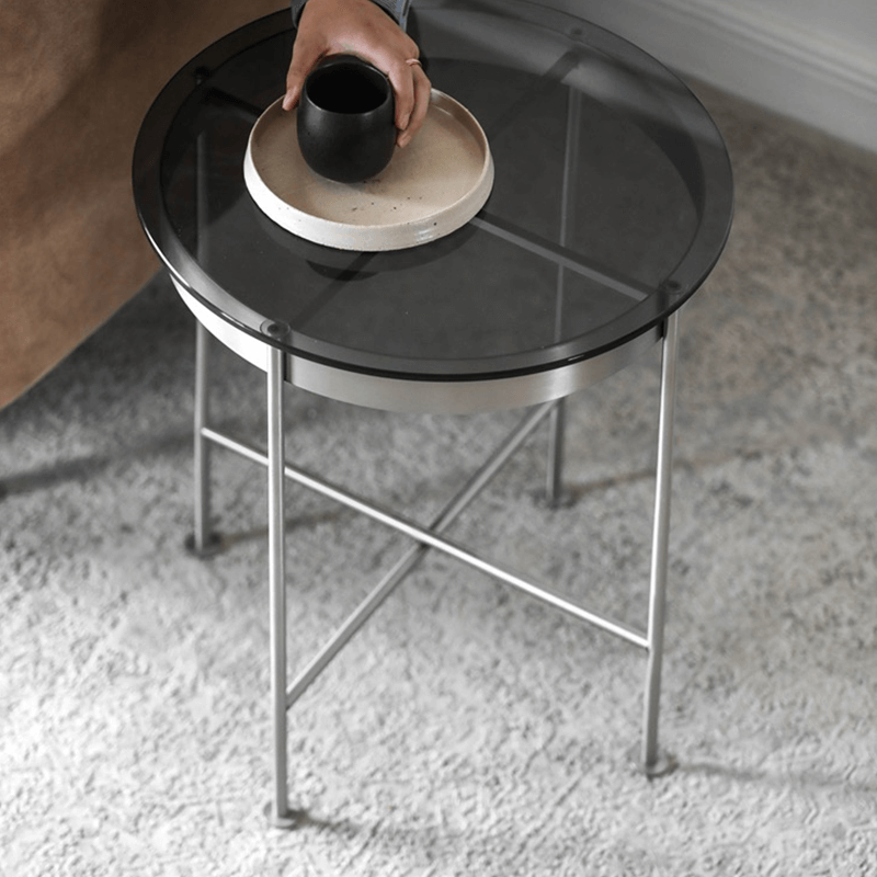 Elegant Italian round glass coffee table showcasing its modern design from a top angle.