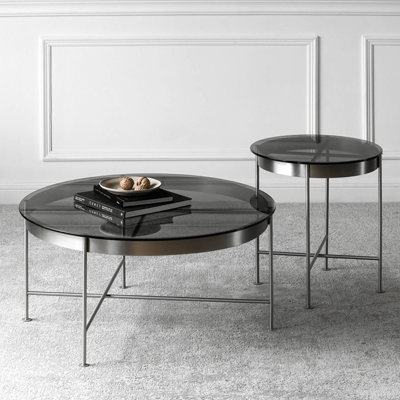 Stylish living room setup featuring the elegant round glass coffee table in black.