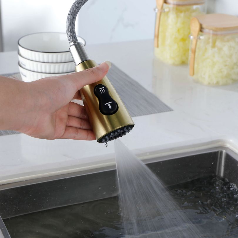 High arc modern kitchen faucet installed above a stylish sink, demonstrating functionality.