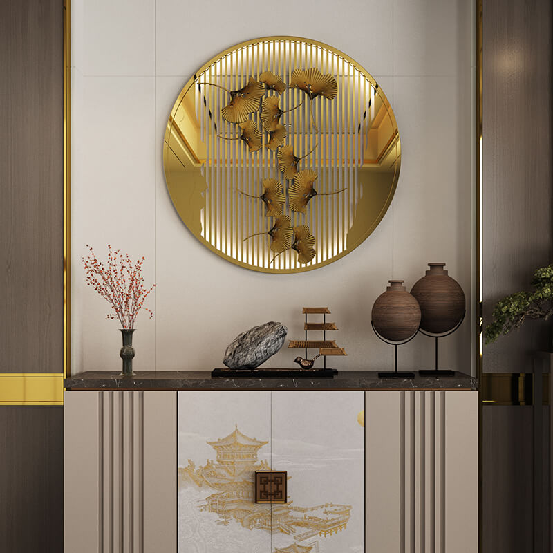 Elegant round gold wall accent displayed in a stylish living room setting.