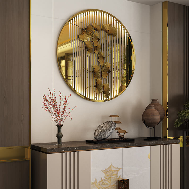 Elegant round gold wall accent displayed in a stylish living room setting.