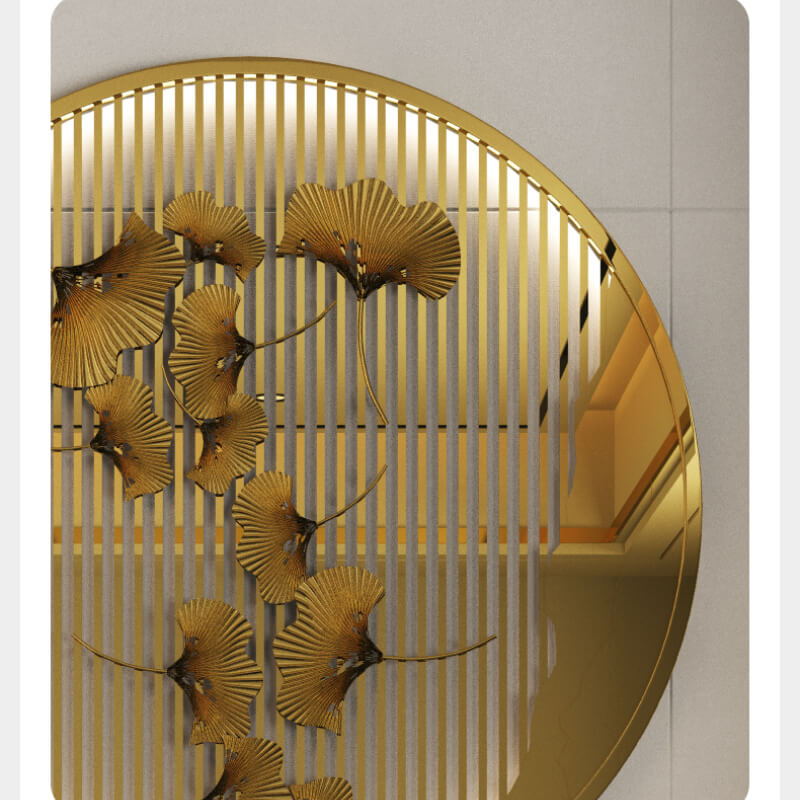 Close-up view of the reflective gold surface of the wall accent.