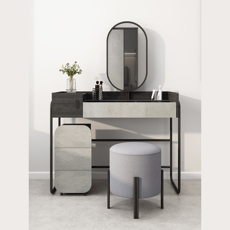 Stylish modern vanity table with five drawers, perfect for organizing beauty products.