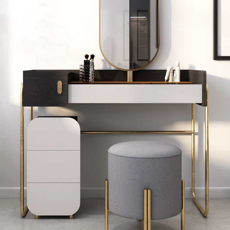 Modern makeup desk with drawers and mirror, showcasing spacious storage in a bedroom.