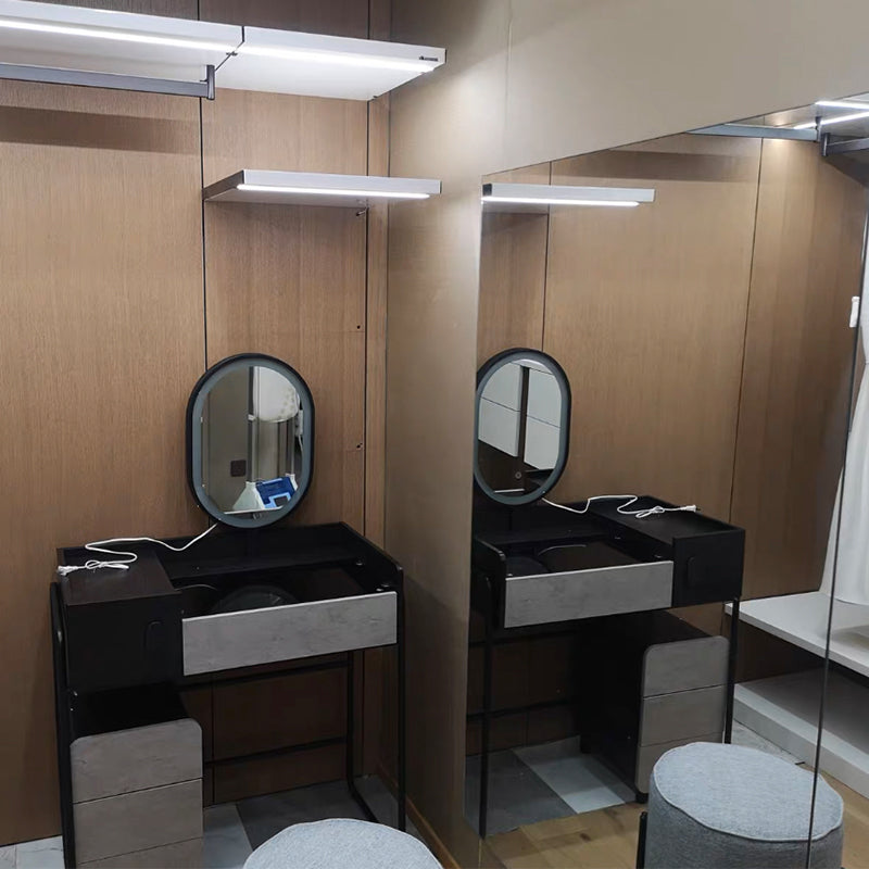 Elegant dressing table with soft cushion stool, highlighting comfort and style.