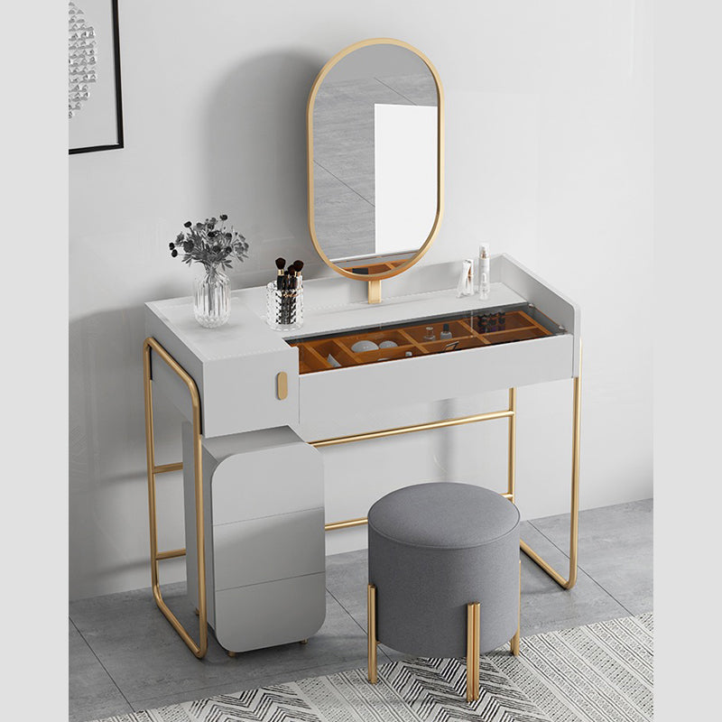 Elegant dressing table with soft cushion stool, highlighting comfort and style.