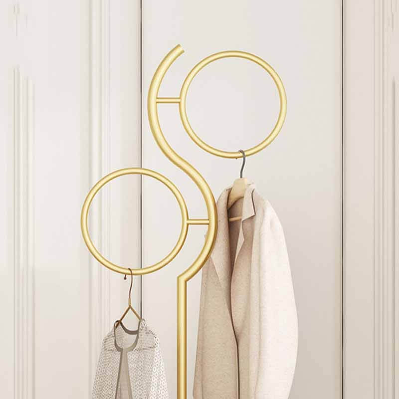 Sleek metal coat rack in a modern entryway, showcasing its stylish round base and two circular holds.