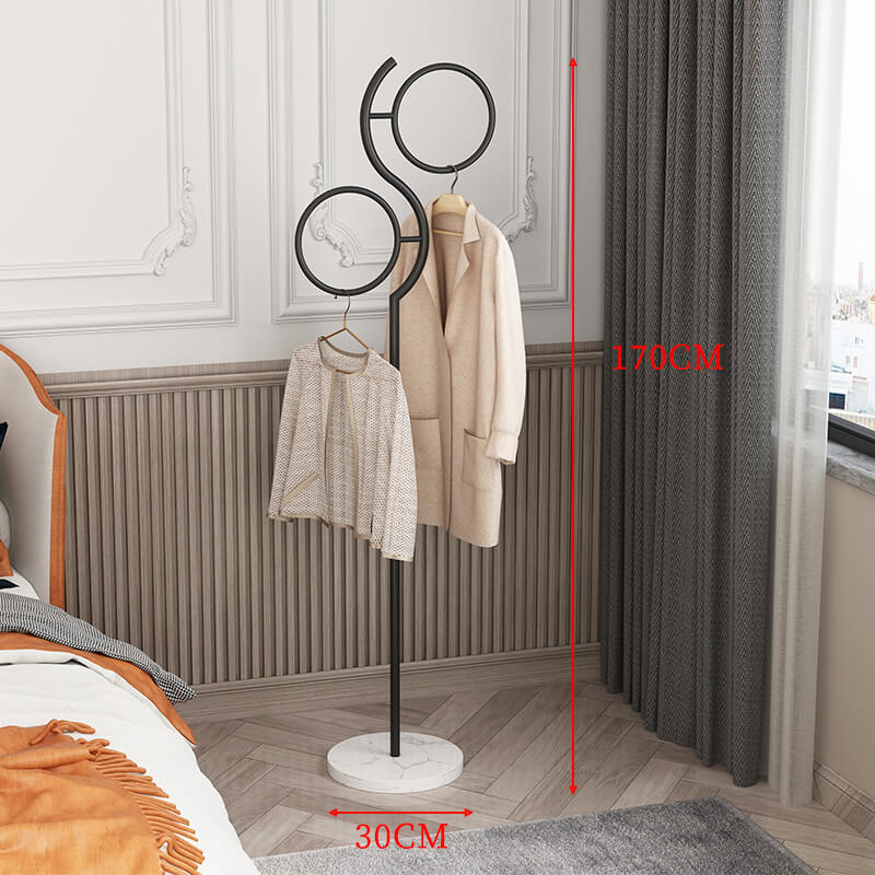 Full view of the modern coat rack in a compact living area, demonstrating its space-saving design.