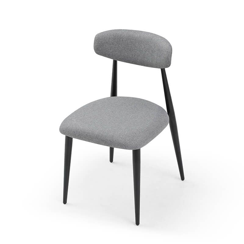 Close-up of the plush seat cushion of the upholstered chair, highlighting comfort and quality.