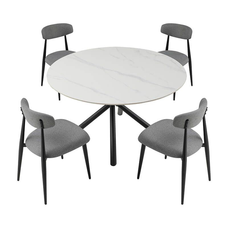 Side view of grey upholstered dining chair with curved backrest