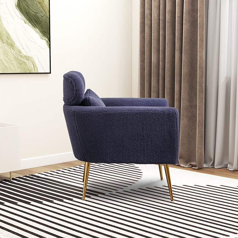 Navy boucle chair in a cozy living room setup, demonstrating its stylish appeal