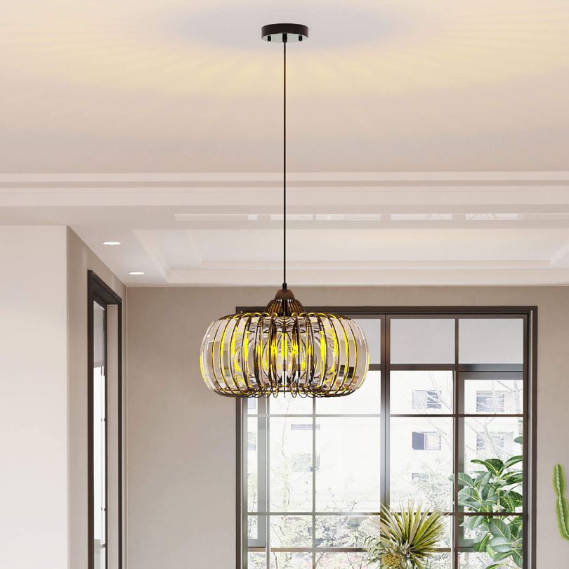 Elegant modern black crystal chandelier showcasing its adjustable height feature in a stylish dining room setting.