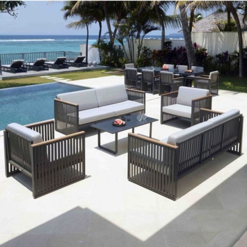 Modern patio set with metal frame and comfortable armrests, perfect for garden relaxation