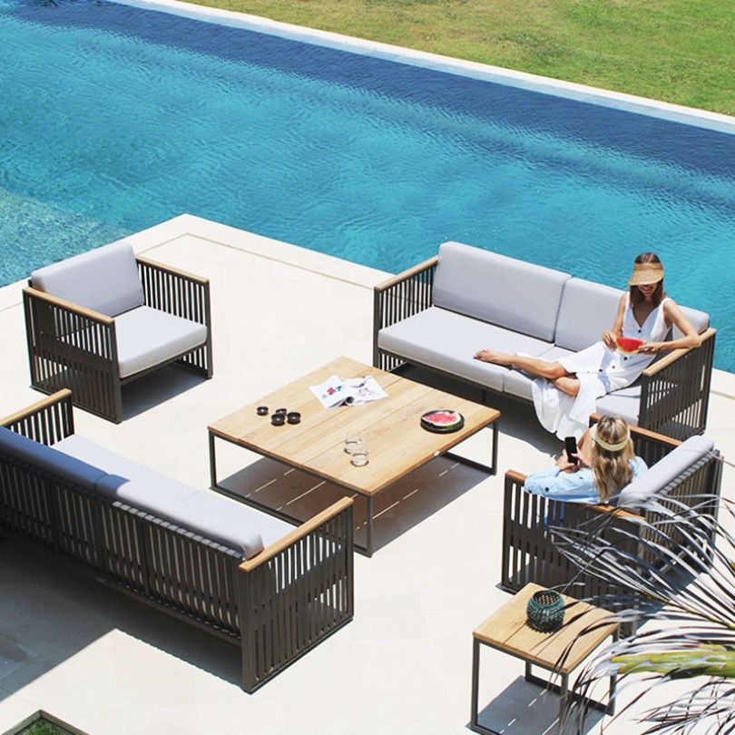 Full outdoor furniture set featuring modern design, metal frame, and plush cushions for patio use