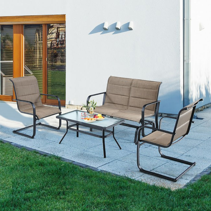 Chic outdoor loveseat set in a cozy backyard setting, perfect for entertaining guests.