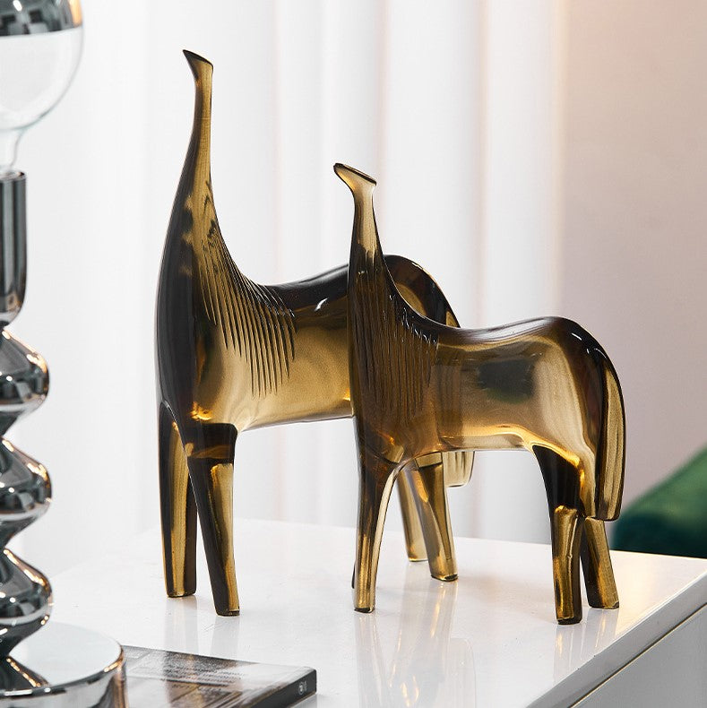 Unique resin animal decor displayed on a mantelpiece, enhancing the rooms aesthetic.