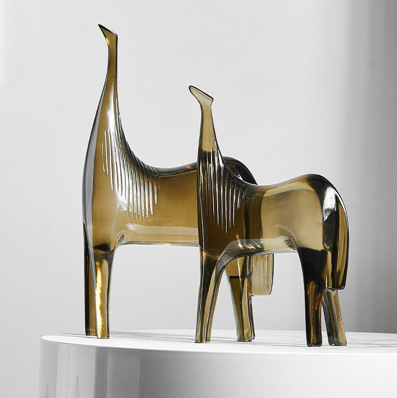 Unique resin animal decor displayed on a mantelpiece, enhancing the rooms aesthetic.